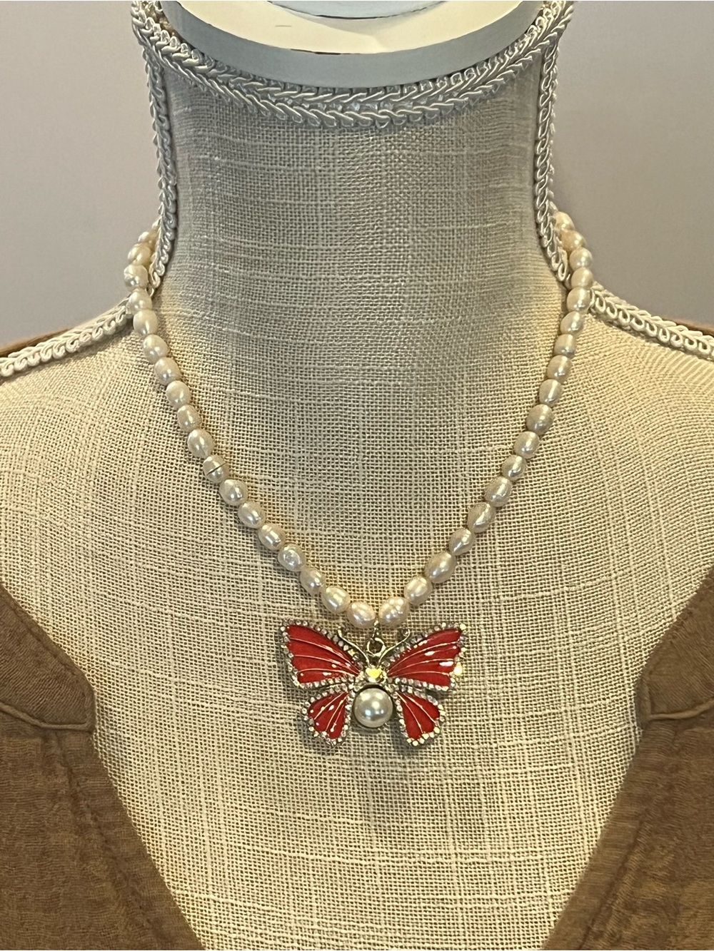 Pearl Beaded Necklace with Red Butterfly Pendant